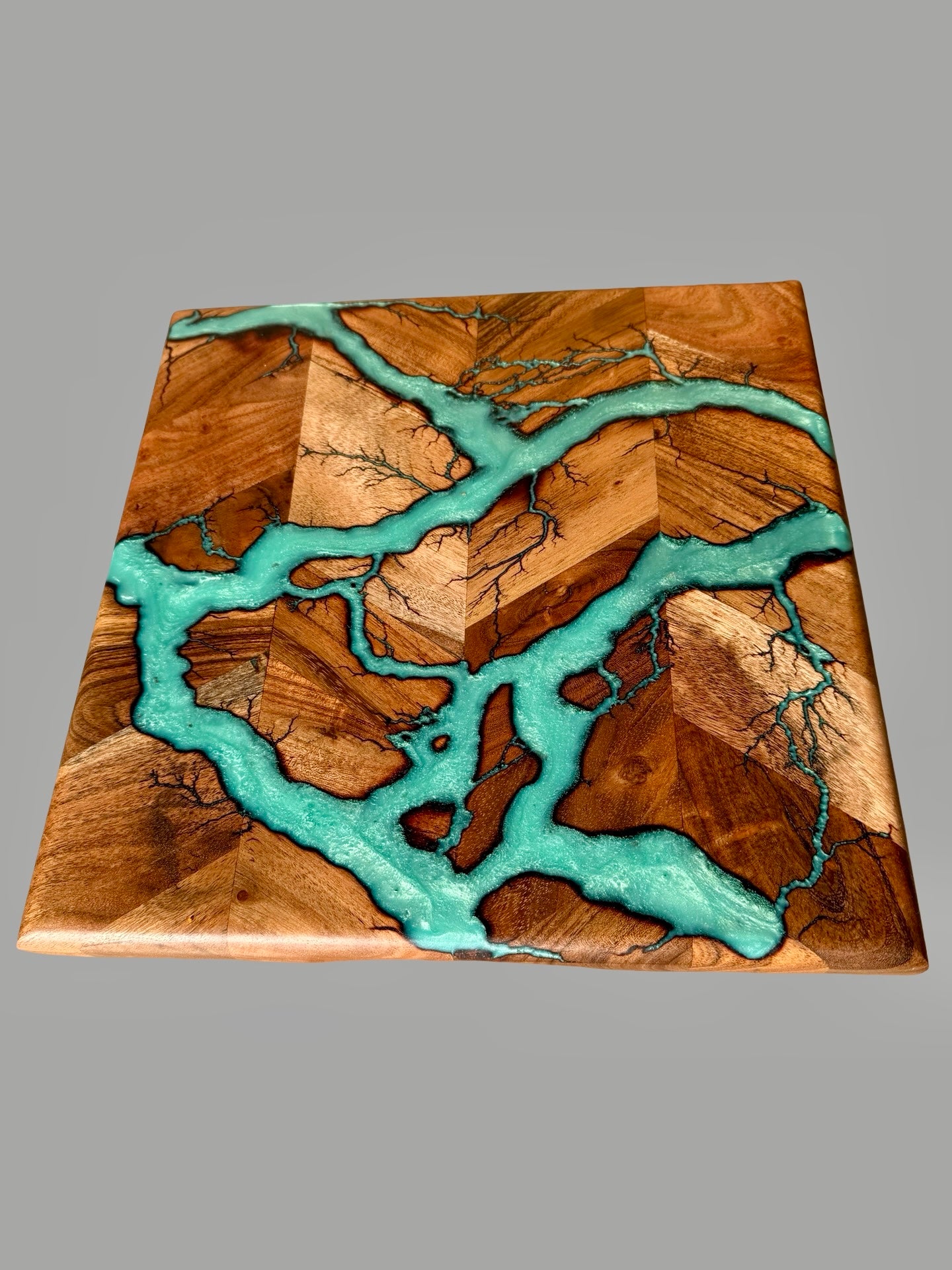 Acacia chopping board with iridescent green resin art made in Australia by fractal flow designs in Victoria