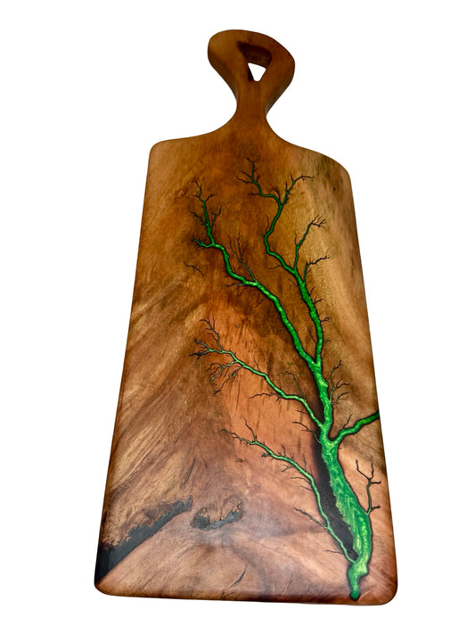 Wooden serving board with a green fractal burning design on a white background made by fractal flow designs, resin boards Australia