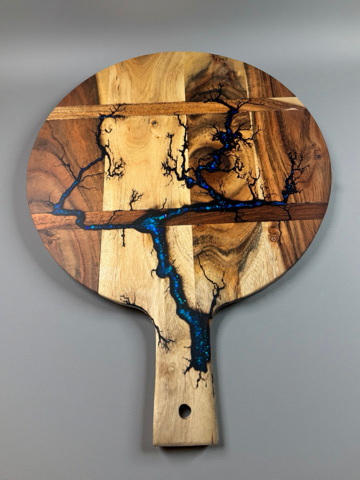 Australian handmade grazing cheese board with glitter blue resin and lightning fractal burn design across acacia timber, Fractal Flow Designs East Gippsland
