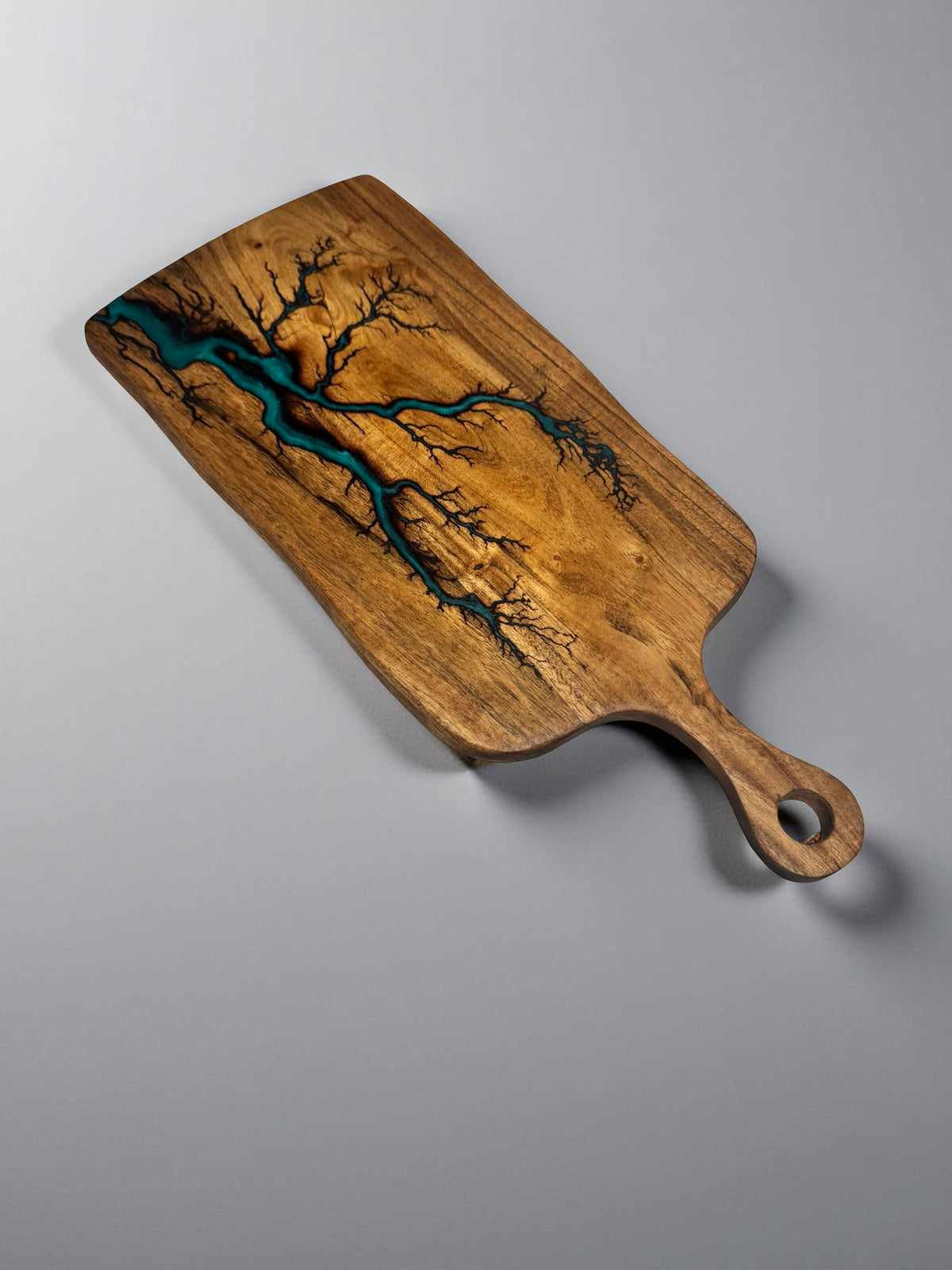 Green resin art paddle crafted from acacia timber with bold fractal lightning burn design, handmade charcuterie serving board East Gippsland Australia, Fractal Flow Designs