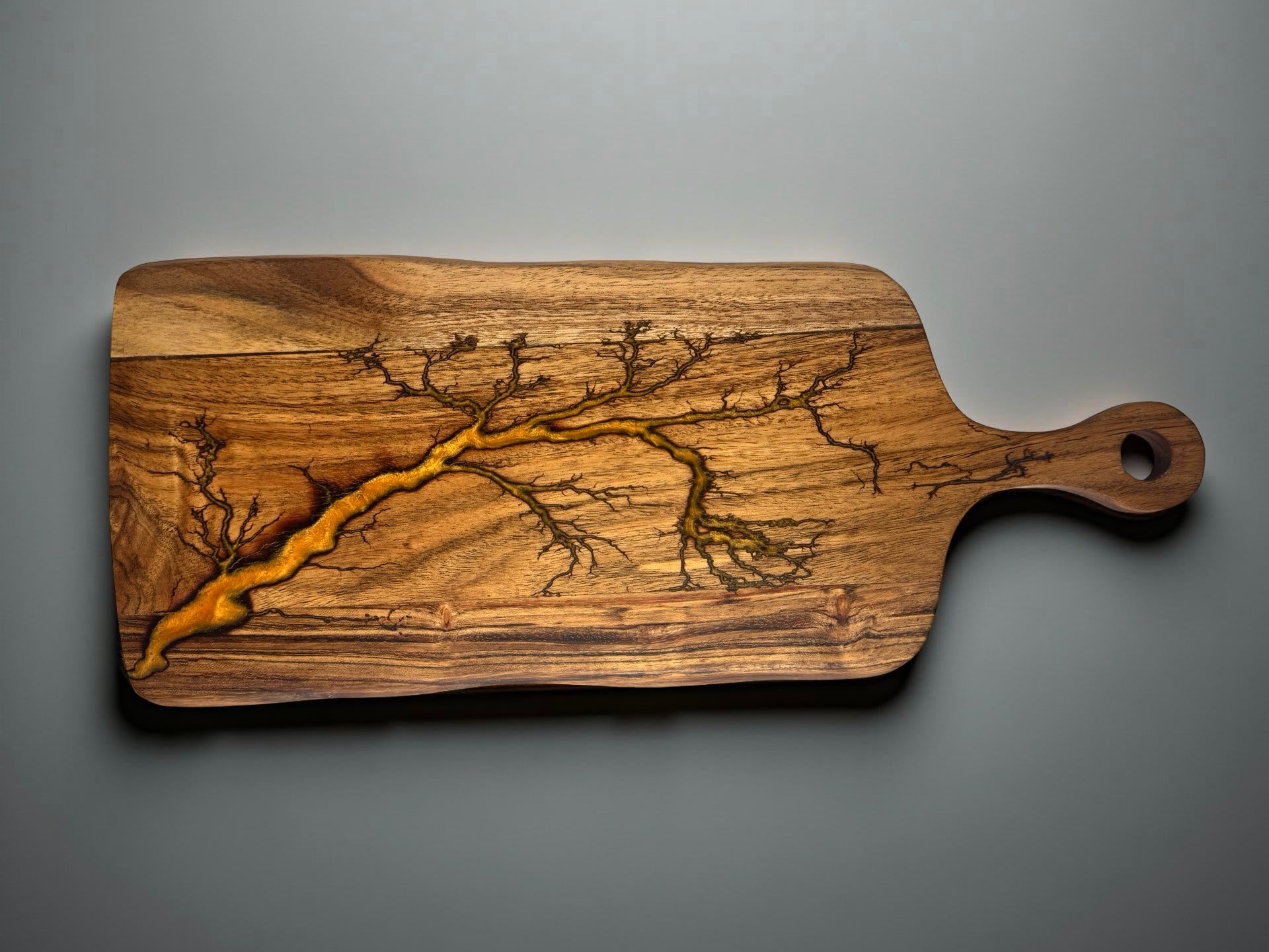 Acacia timber grazing paddle board with bold orange resin and fractal lightning burn artwork, handcrafted resin serving board East Gippsland Australia, Fractal Flow Designs