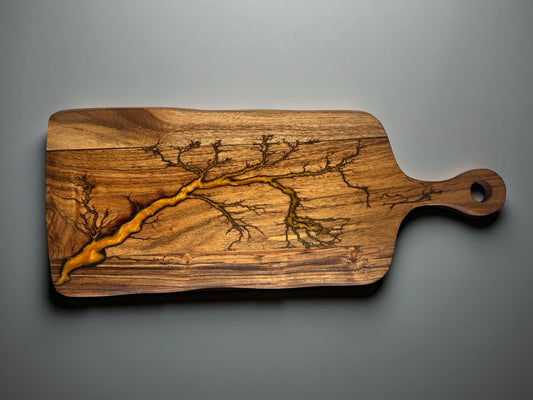 Acacia timber grazing paddle board with bold orange resin and fractal lightning burn artwork, handcrafted resin serving board East Gippsland Australia, Fractal Flow Designs