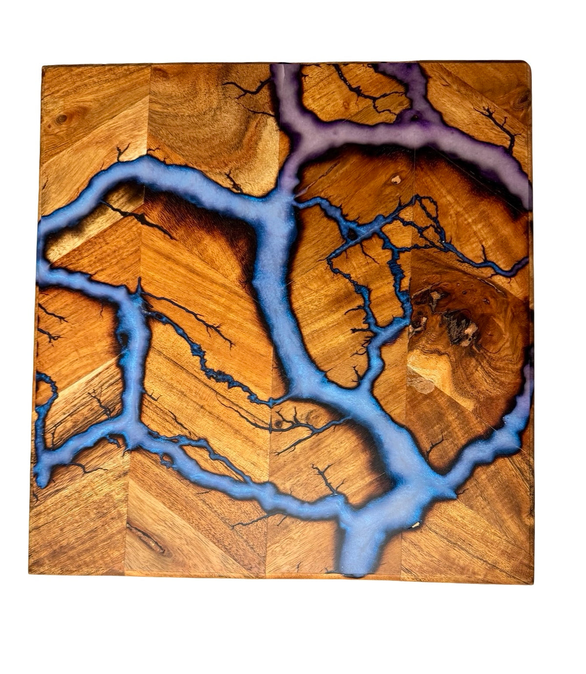 Acacia timber chopping board featuring shimmering iridescent blue resin and natural fractal burning pattern, artisan resin boards Australia, Fractal Flow Designs