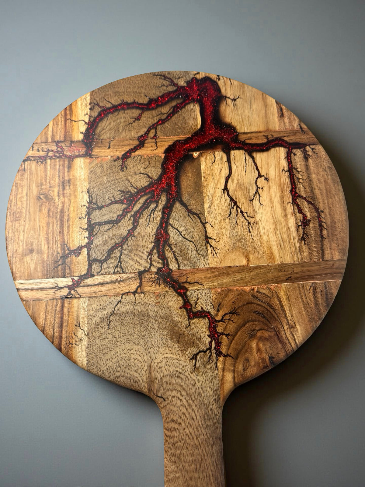 Acacia timber cheese board with vibrant red flash resin inlay and fractal burn lightning design, Australian resin board handmade in East Gippsland, Fractal Flow Designs