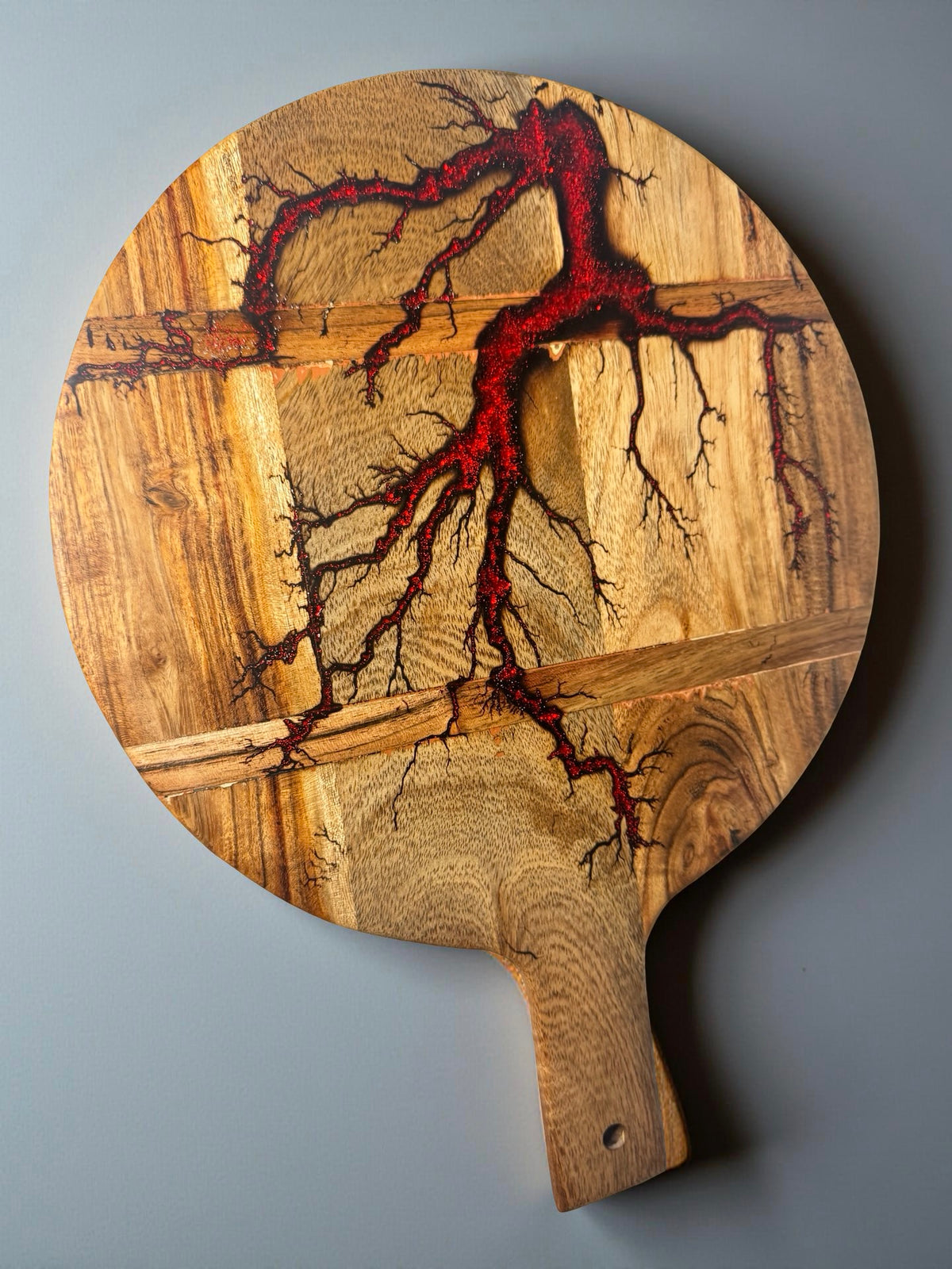 Red flash resin cheese board with fractal burning lightning pattern on acacia timber, handcrafted resin board, East Gippsland Australia, Fractal Flow Designs