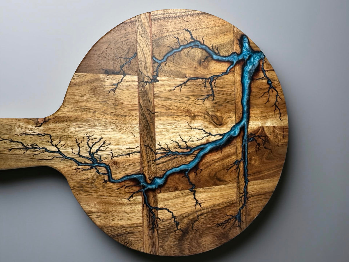 Acacia serving cheese board with bright sky blue resin and fractal lightning burn pattern, artisan resin board East Gippsland Australia, Fractal Flow Designs