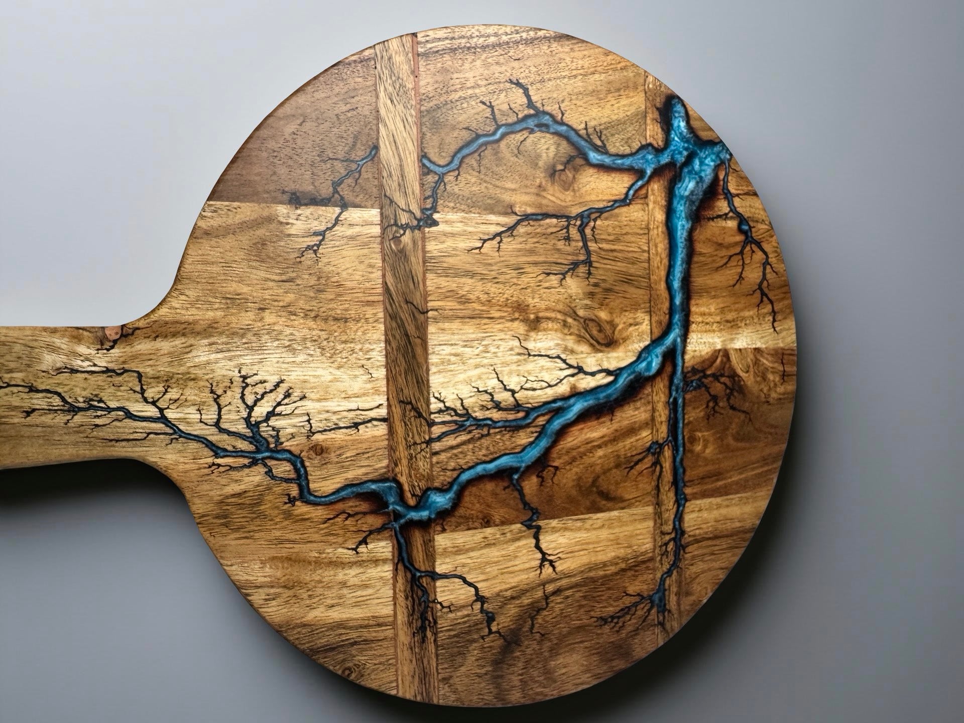 Acacia serving cheese board with bright sky blue resin and fractal lightning burn pattern, artisan resin board East Gippsland Australia, Fractal Flow Designs