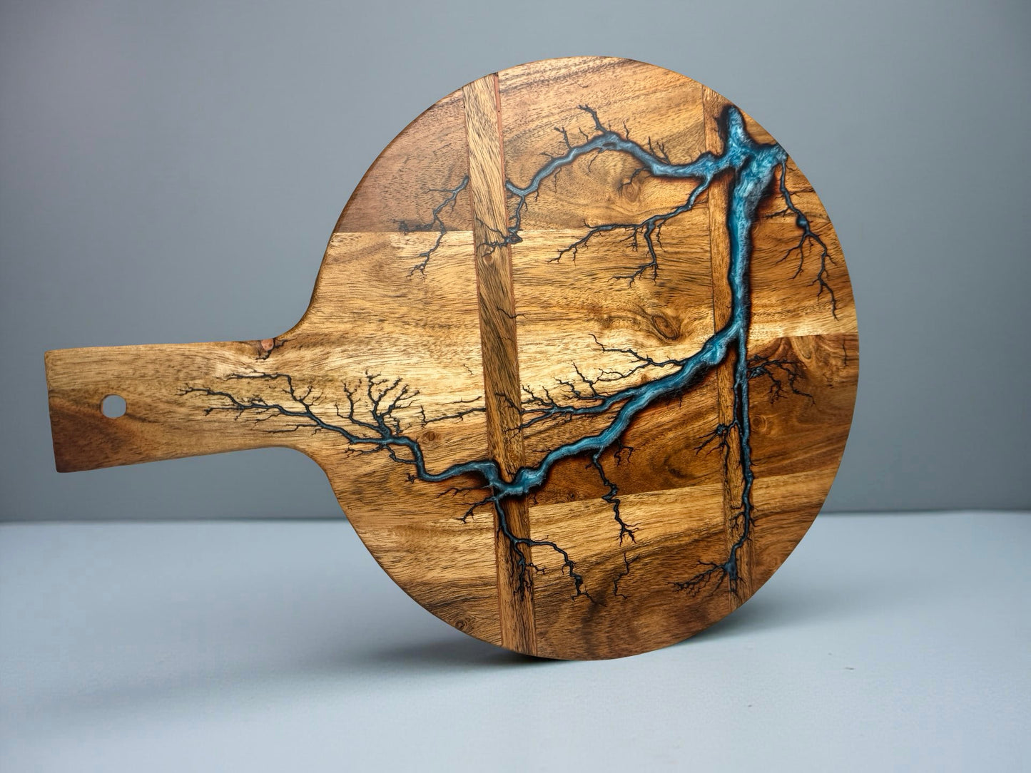 Sky blue resin charcuterie cheese board with fractal lightning burn design across acacia timber, premium resin boards Australia, Fractal Flow Designs
