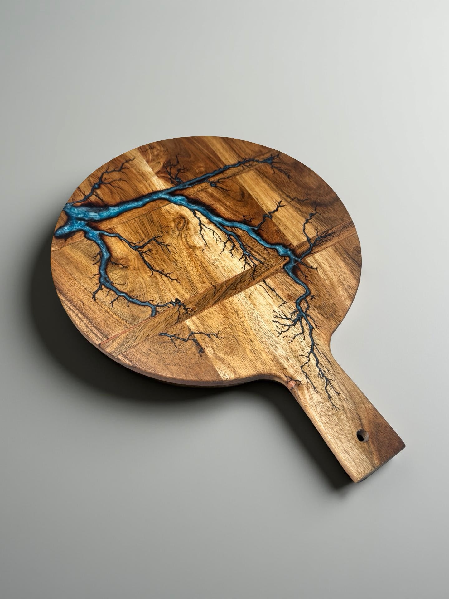Handmade acacia cheese board featuring sky blue resin river and fractal burning artwork, Australian resin board East Gippsland, Fractal Flow Designs