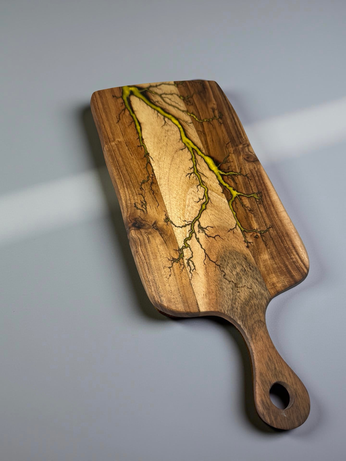 Premium resin paddle cheese board with bold yellow resin inlay through acacia timber after fractal burning process, Australian resin board, Fractal Flow Designs
