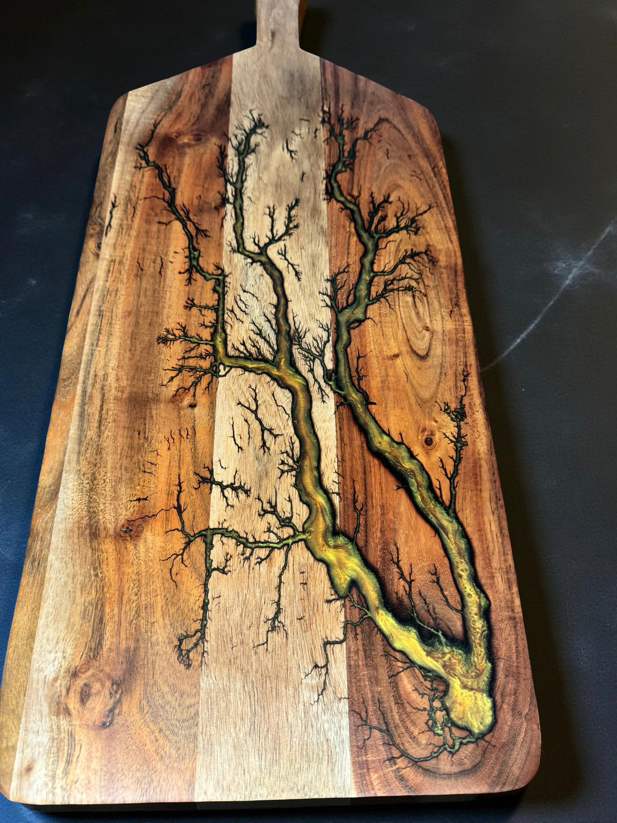 Resin paddle board with electric fractal inspired detail crafted from sustainable local timber