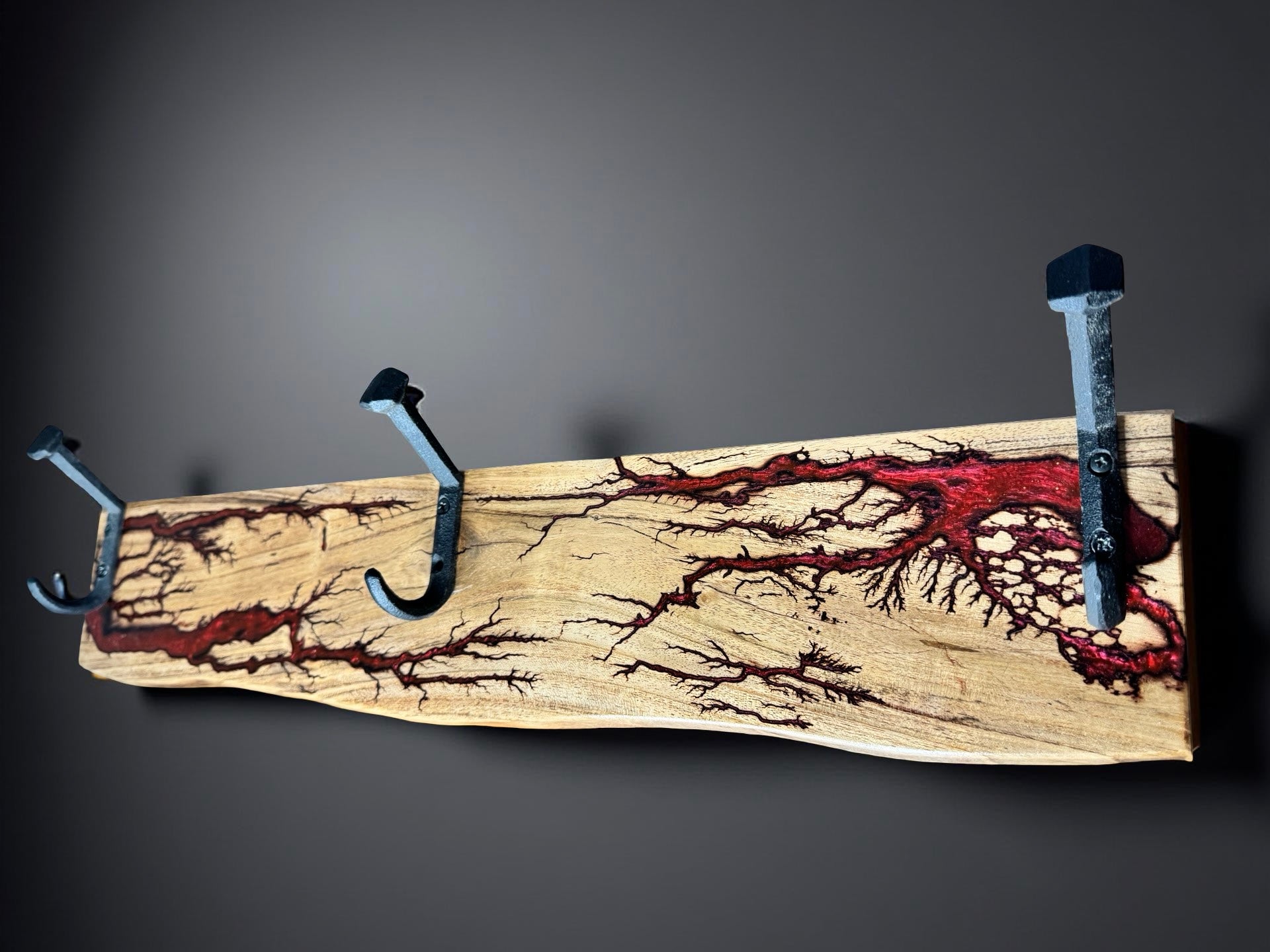 Solid timber coat rack with red resin art and rustic black metal hooks, premium Australian wall mounted product