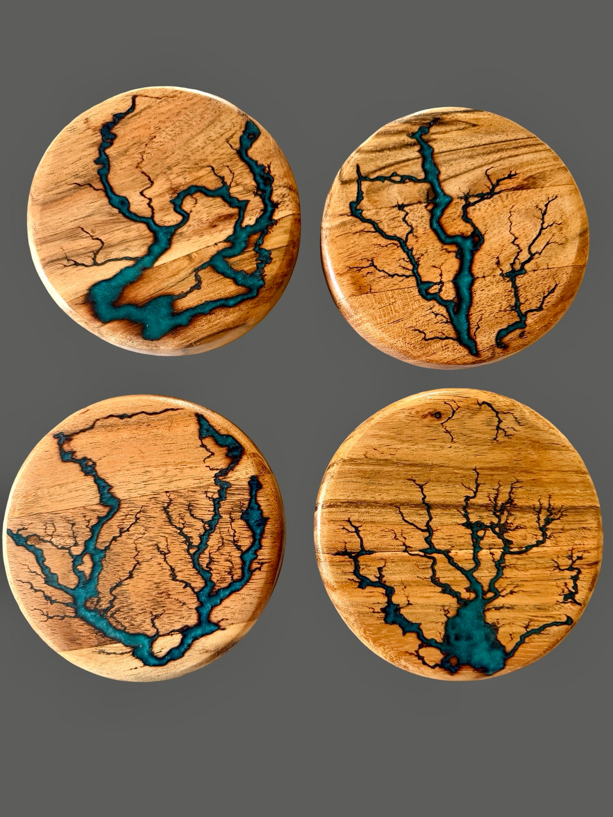Luxury set of four acacia coasters with marine green resin inlay, handcrafted from premium hardwood, Australia