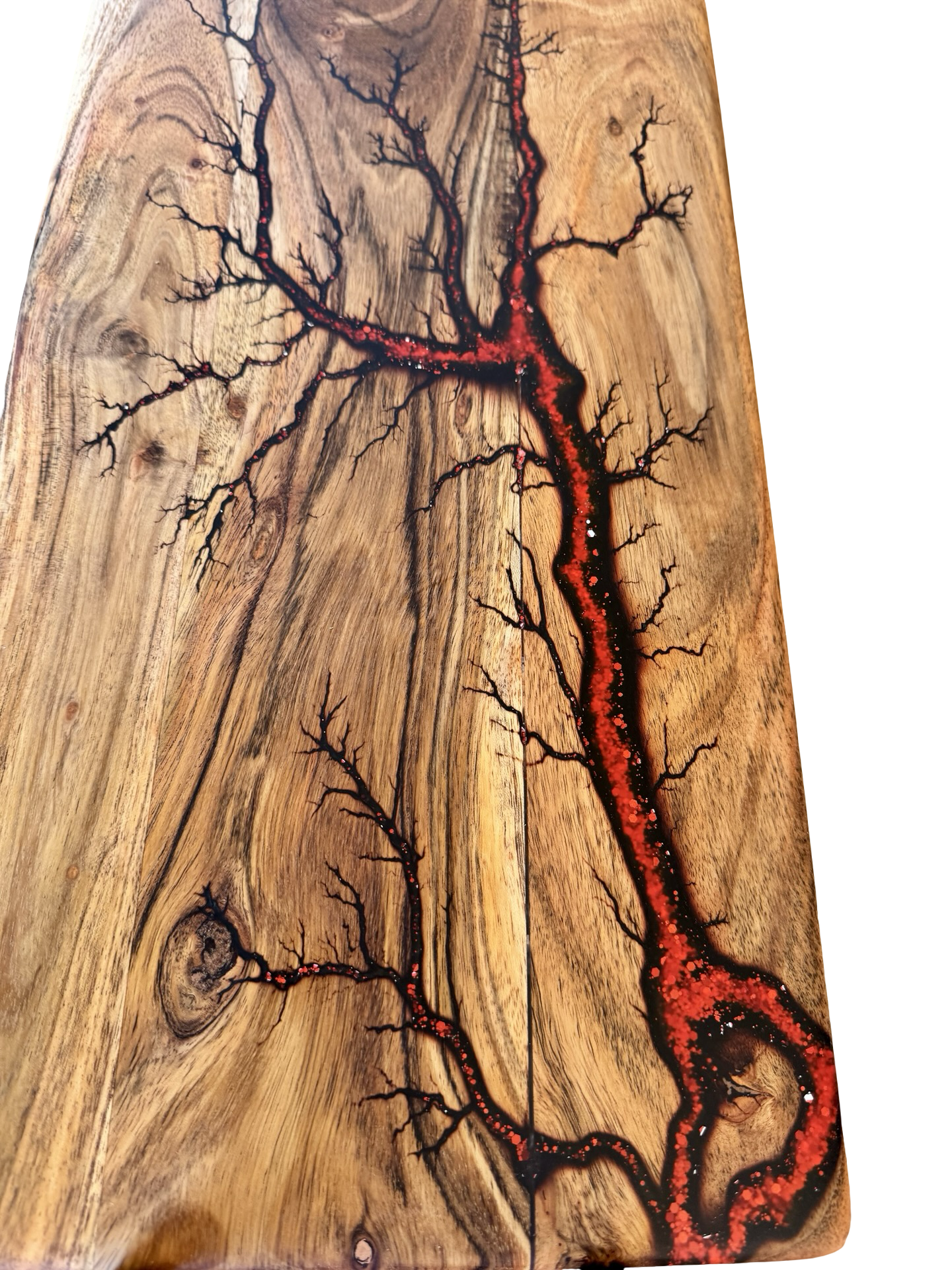 Close up view of a Beautiful red resin art grazing boards made by fractal flow designs in Victoria