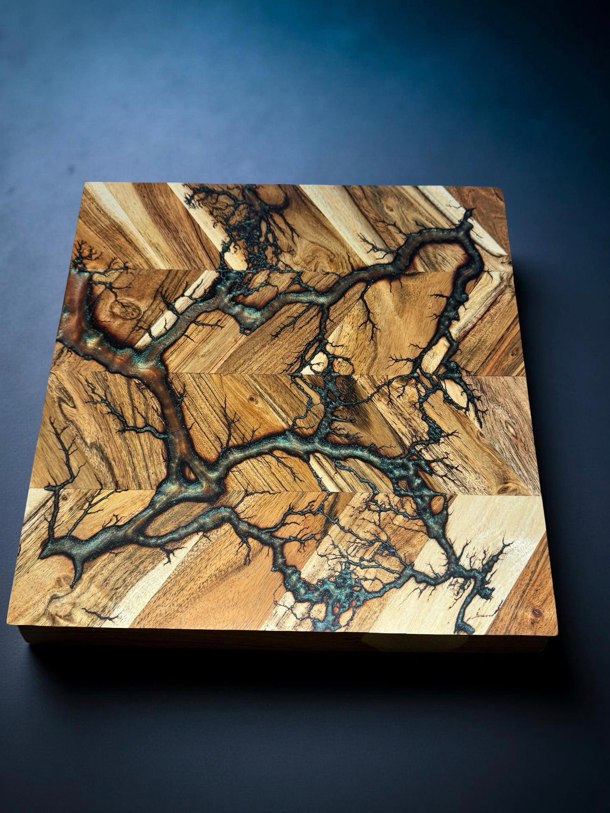 Square chopping board 320 x 320 featuring red green chameleon resin effects and high voltage fractal burning details sustainable Australian timber handmade by Fractal Flow Designs Australia’s resin board brand in East Gippsland